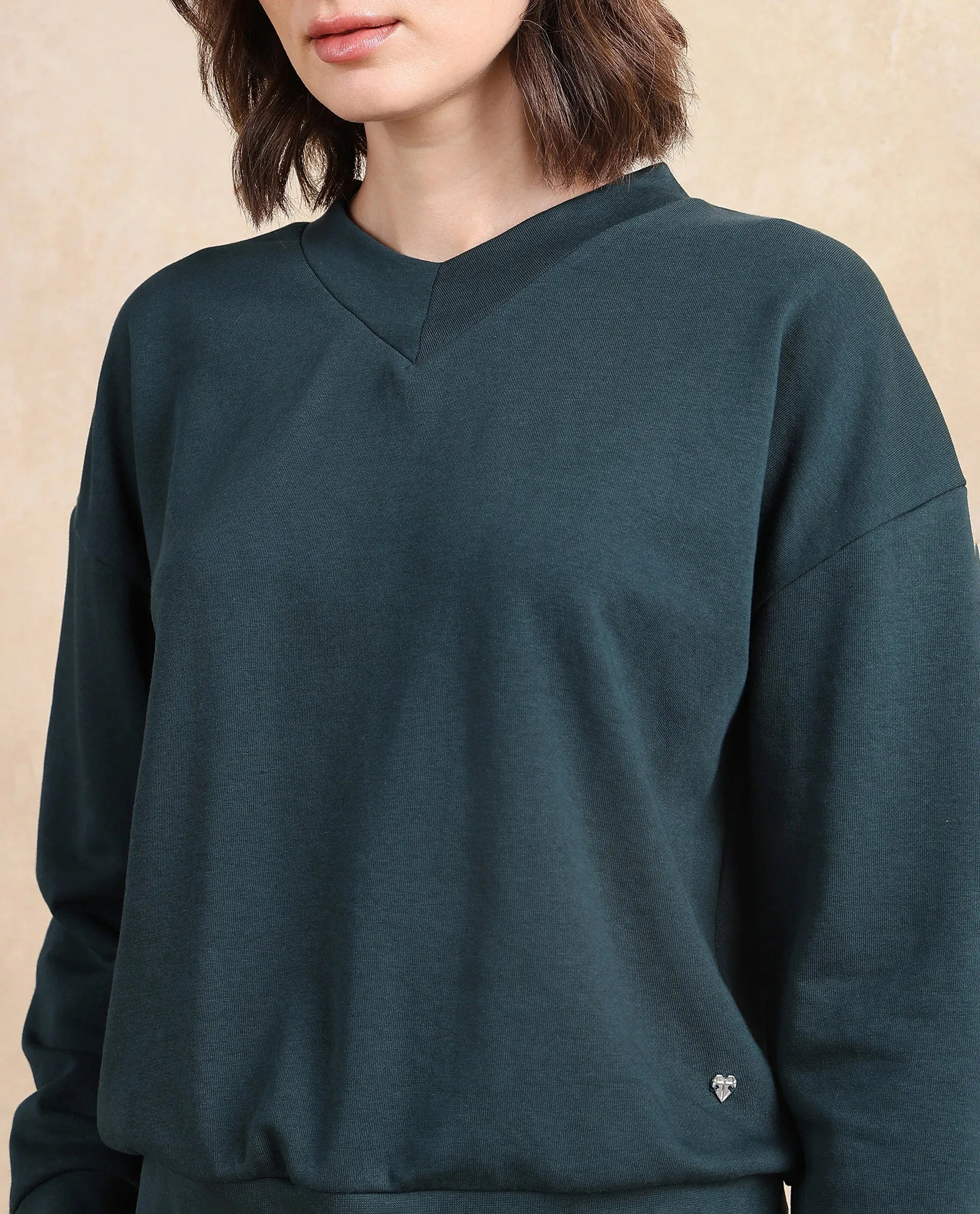 Rareism Women Vitoo Dark Green Cotton Blend Fabric Full Sleeve Crew Neck Relaxed Fit Plain Sweatshirt